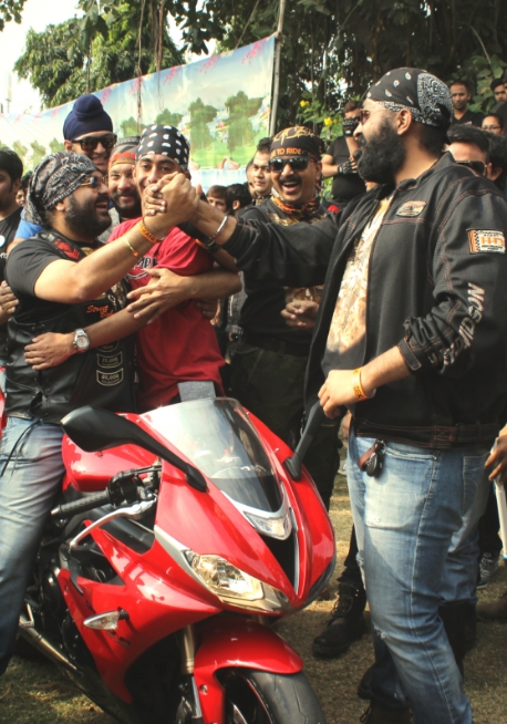 Riders celebrating at a Chai & Pakoda Ride